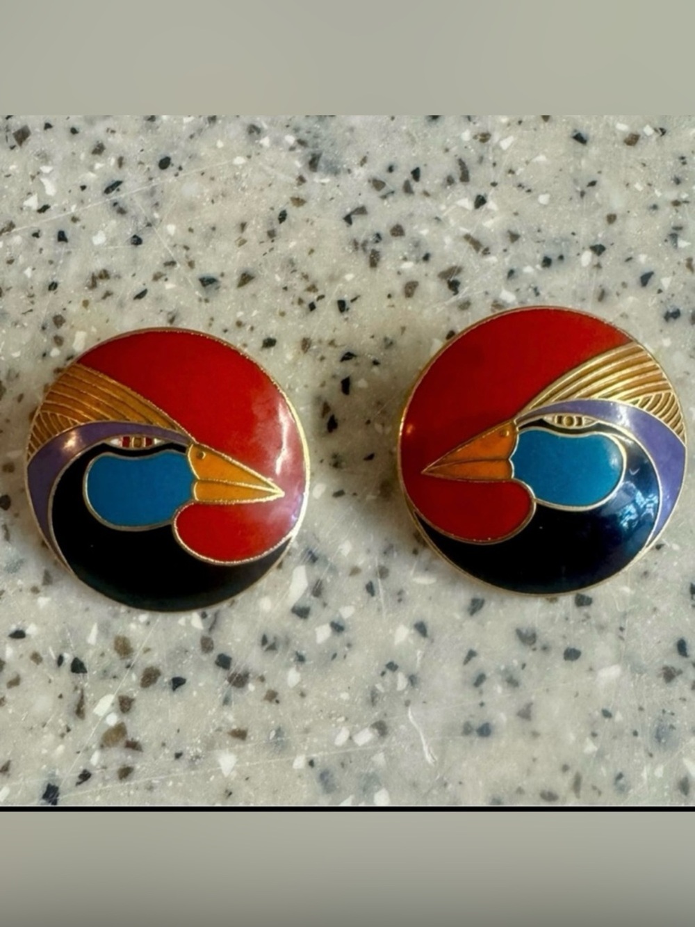 Vintage Laurel Burch gold red blue purple orange and black enamel earrings.